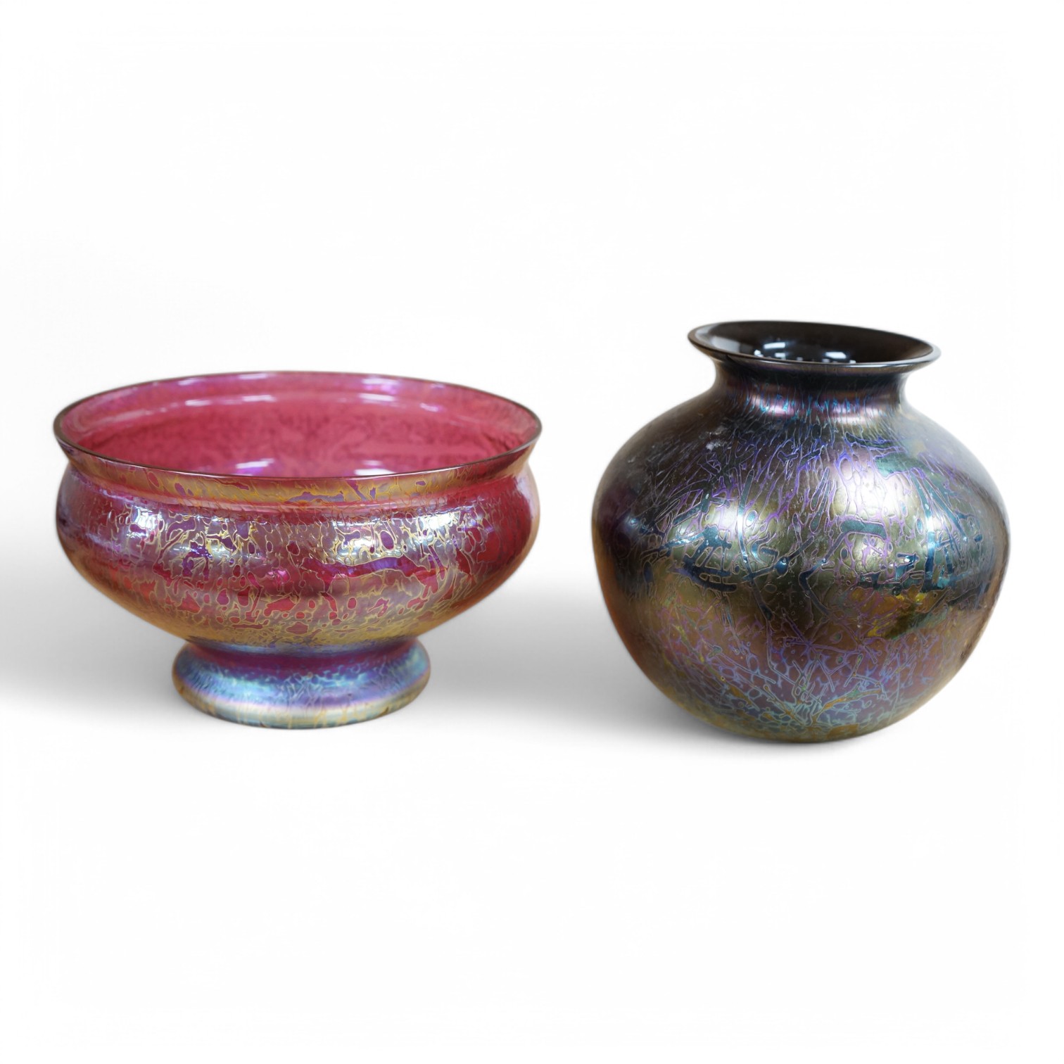 An iridescent art glass pedestal bowl and similar vase, bowl 20cm diameter. Condition - good